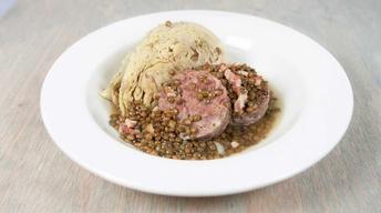 Smoked Garlic Sausage Braised With Lentils, Cabbage & Cider image