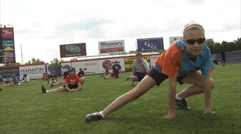 Hannah Takes a Swing at the B-METS Baseball Camp