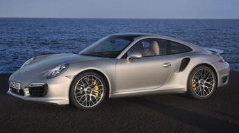 2014 Porsche 911 Turbo & 2014 Nissan Rogue image