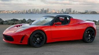 2011 Tesla Roadster 2.5 & 2011 Infiniti QX56 image