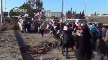 Homs evacuations continue amid delicate ceasefire image