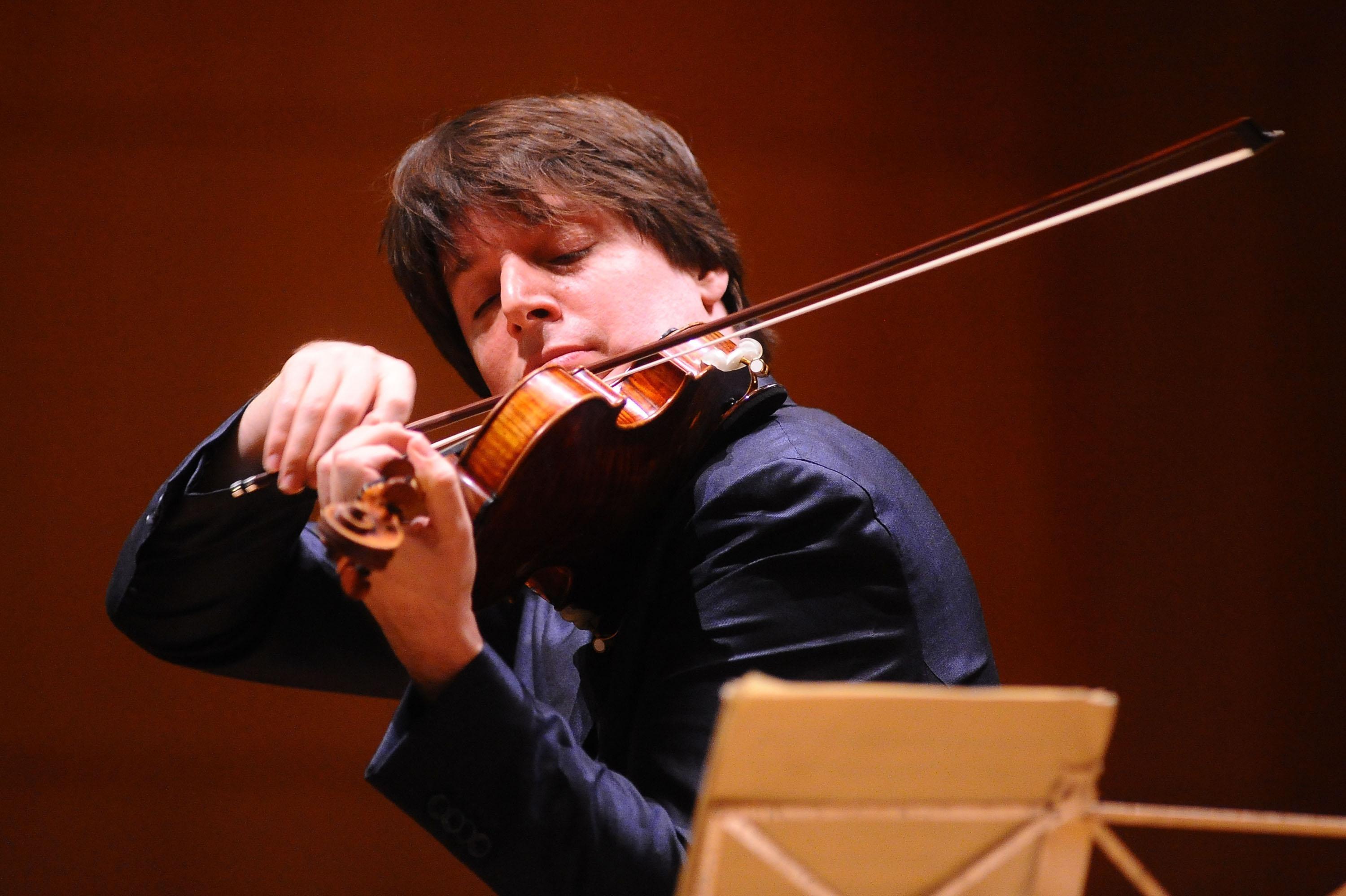 PBS NewsHour Violinist Joshua Bell turns train station into concert