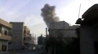 Assad Forces Try to Retake Border Town, Help From Hezbollah image