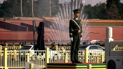 soldier standing at attention in Tiananmen Square