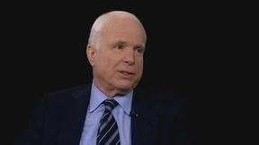 Image of John McCain on Vladimir Putin