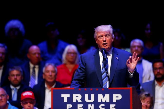 Trump visits Democratic stronghold, trails in key polls