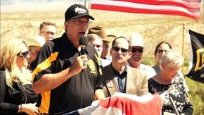 Image of Rancher’s government dispute draws armed protesters