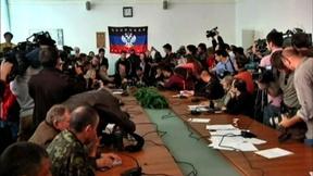Image of Pro-Russian protesters hold ground despite deal