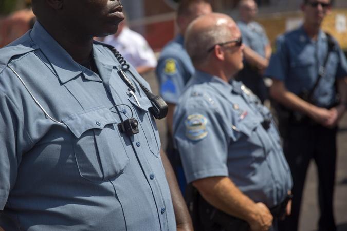 How can Ferguson law enforcement break a pattern of bias?