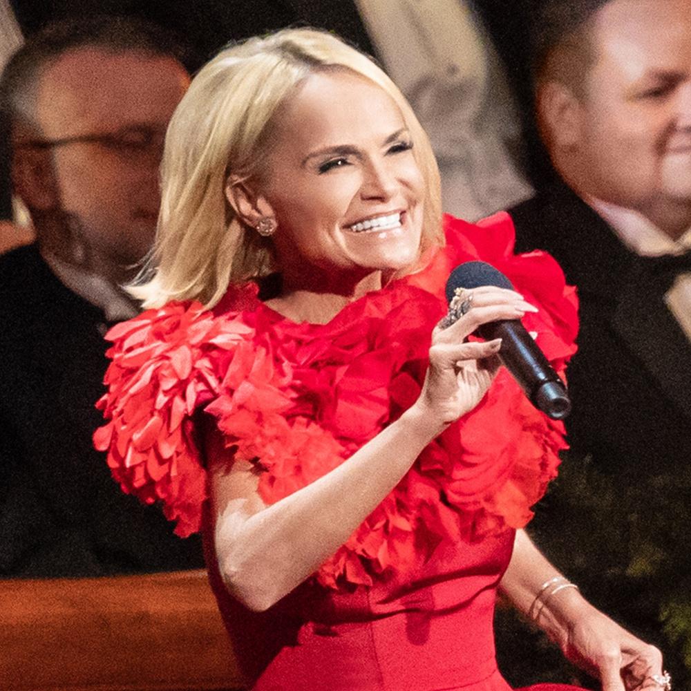 Kristin Chenoweth singing Come On, Ring Those Bells with The Tabernacle Choir behind her.