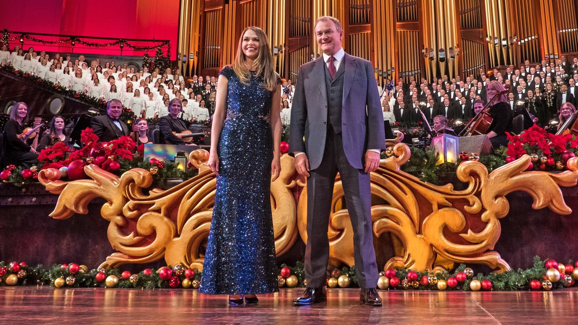 With the large organ in the background, Mack Wilberg stands among The Orchestra at Temple Square and The Tabernacle Choir.