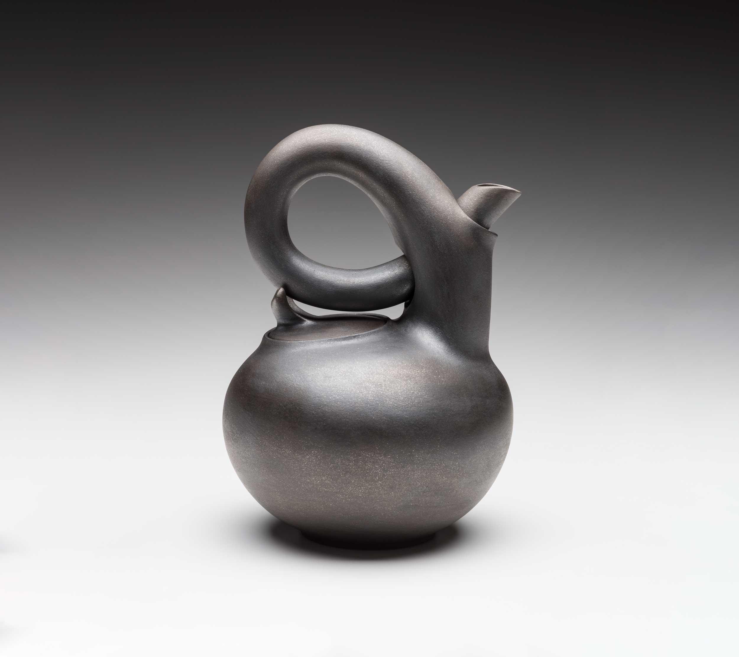 Christine Nofchissey McHorse (American, 1948-2021), Black Teapot, 2010, micaceous terra cotta clay, 12.88 x 9.25 x 9.38″, Kamm Collection