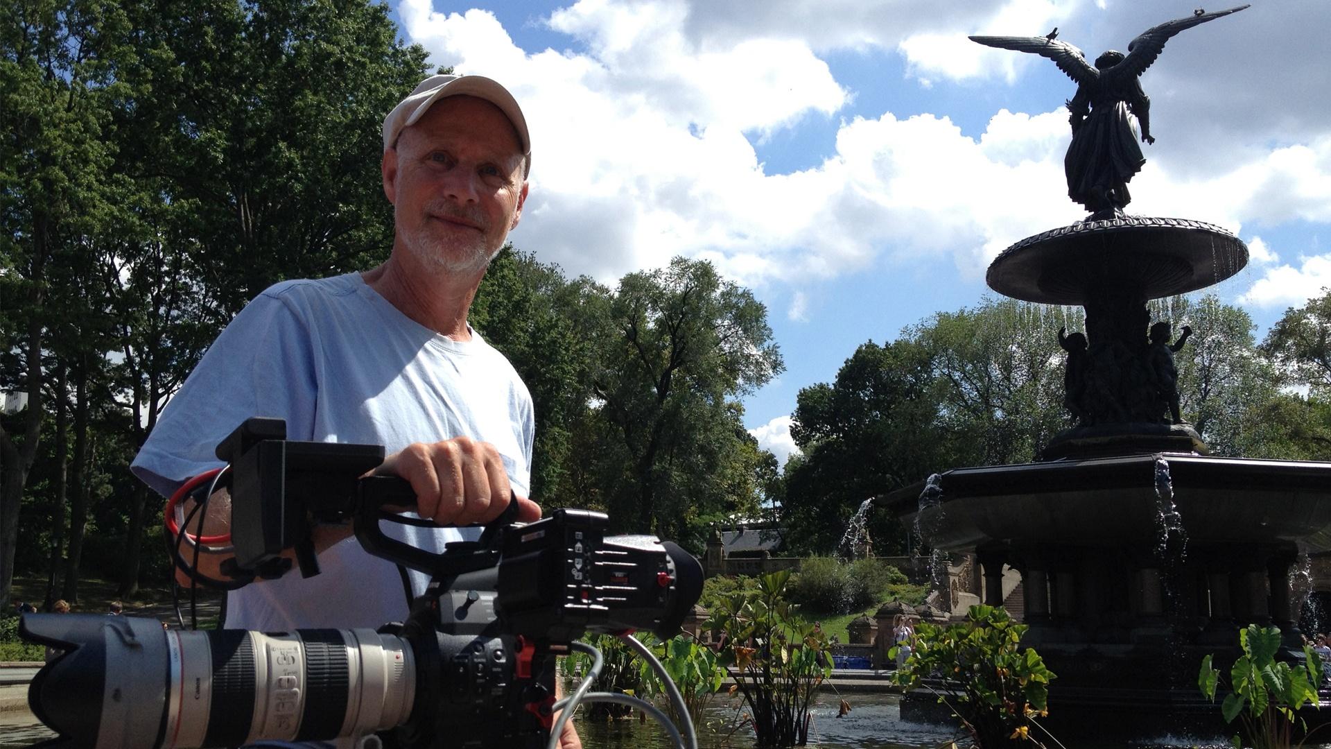 Photo of a cameraman on the shoot of "Designing America".