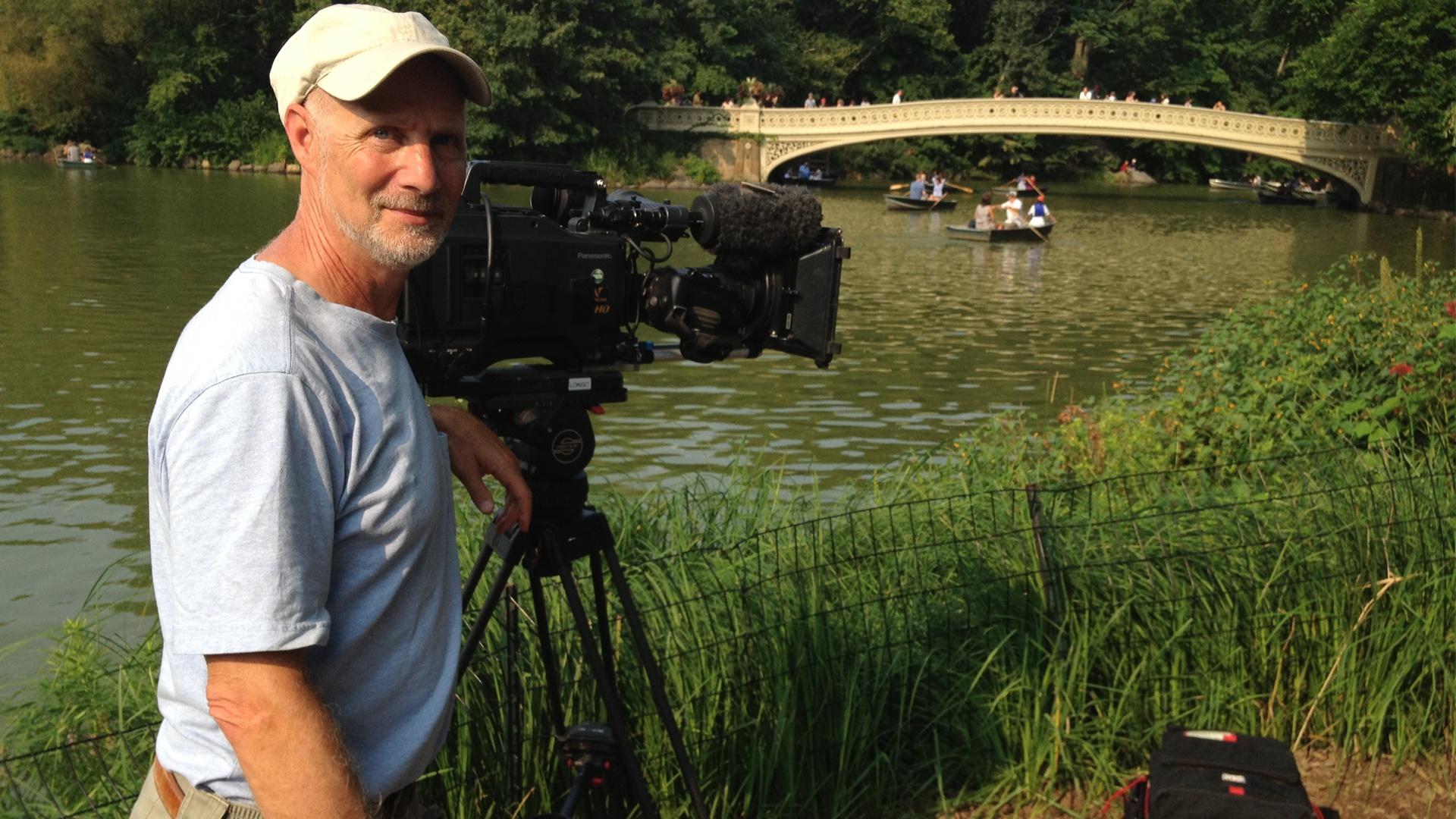 Photo of a cameraman on the shoot of "Designing America".