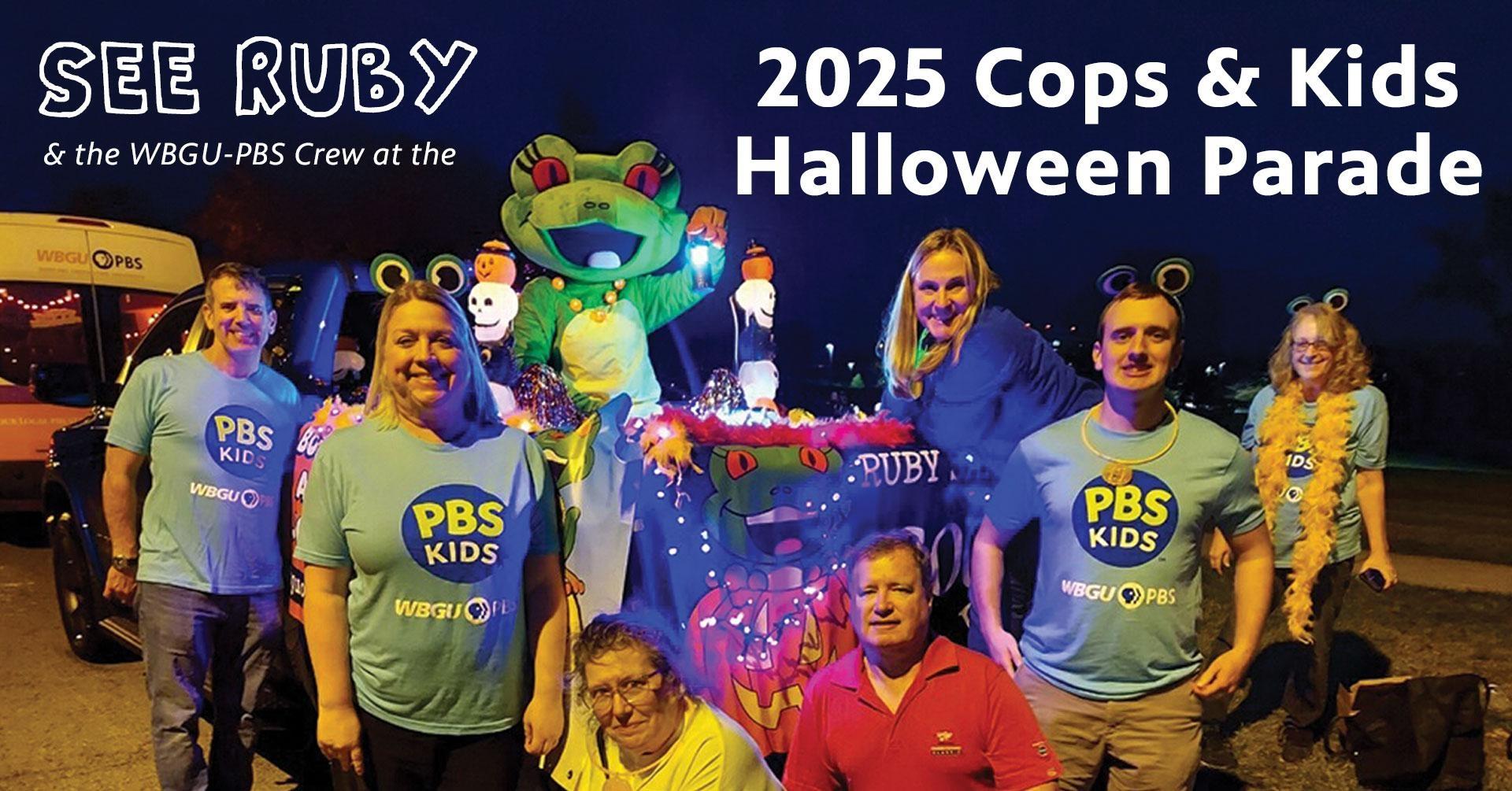 Photograph of WBGU mascot Ruby the Red-Eyed Tree Frog holding a lantern and sitting in the back of a pick-up truck and surrounded by 7 people wearing light blue PBS KIDS t-shirts. The text on the graphic reads: See Ruby & the WBGU-PBS Crew at the 2025 Cops & Kids Halloween Parade.