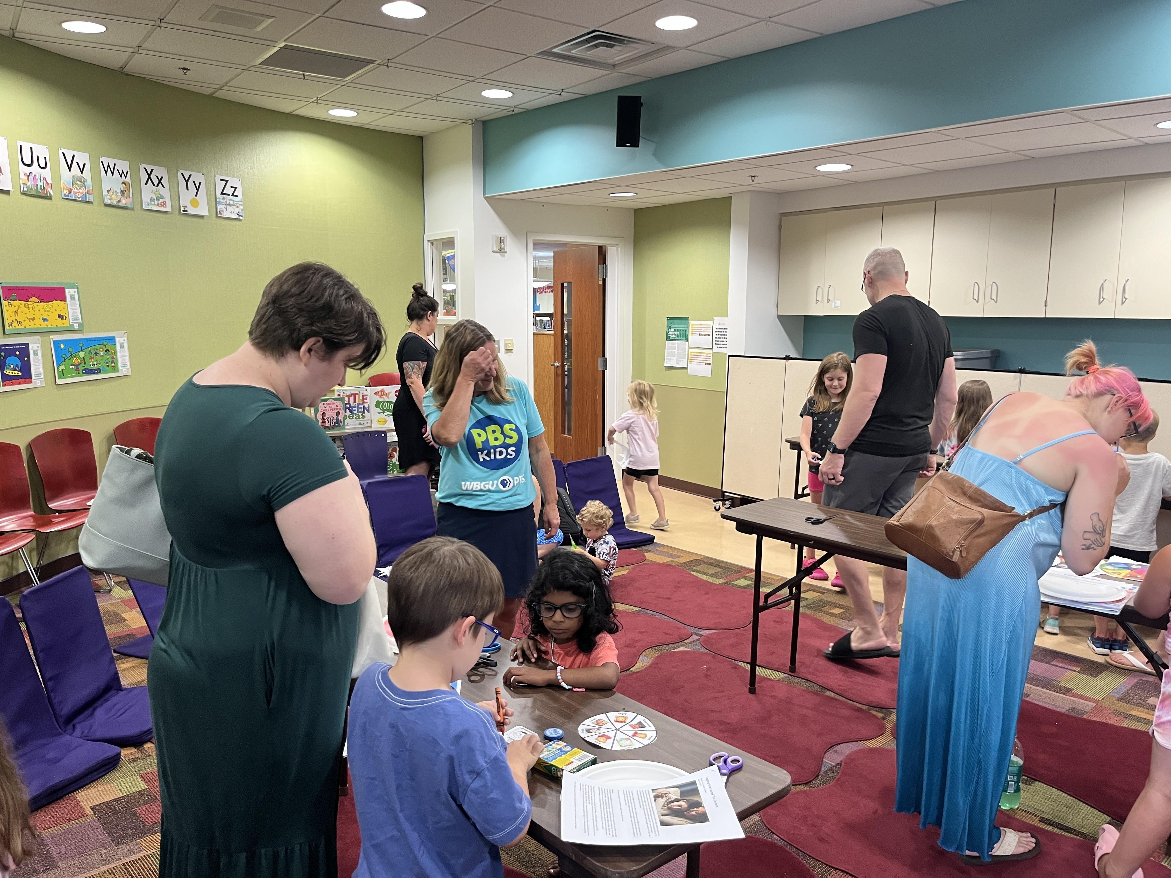 Kids enjoyed posing with Daniel Tiger, exploring their feelings through interactive activities, and creating their own colorful emotional spinner games—all while parents and caregivers joined in the fun and learning!