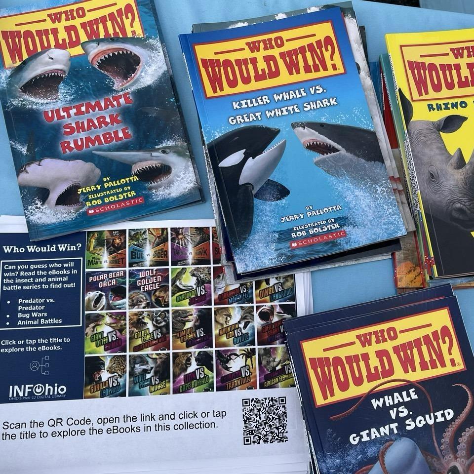 These INFOhio Who Would Win Choice Board Flyers and children's books were distributed to families who attended the Defiance Lilac Fest on May 9, 2026