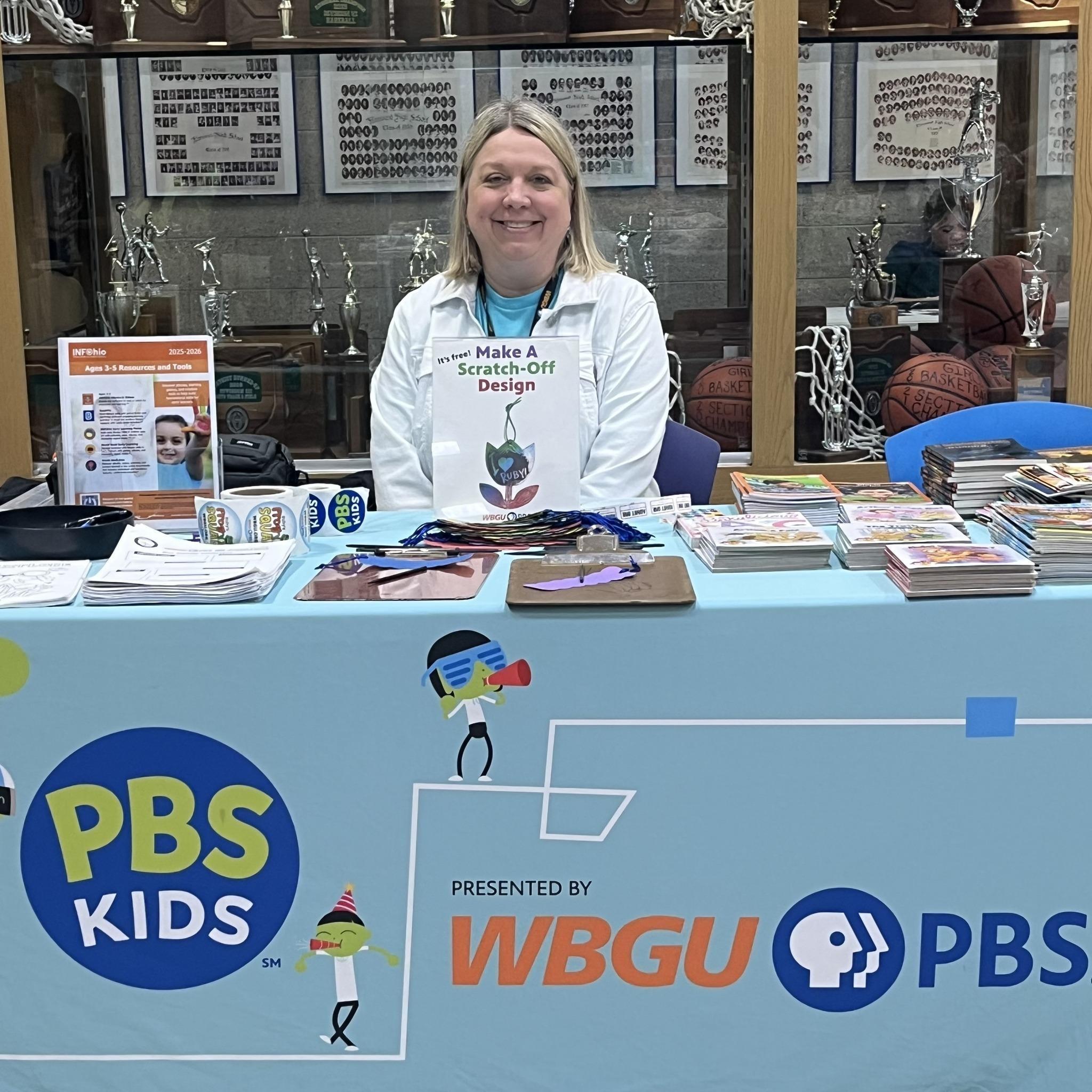 April 25, 2026 - WBGU Director of Education and Outreach Kelly Pheneger distributes INFOhio Resources and children's books to families at the Wood Co. Family & Children First Council's Spring Fling Event at Elmwood High School in Wood County, Ohio. 