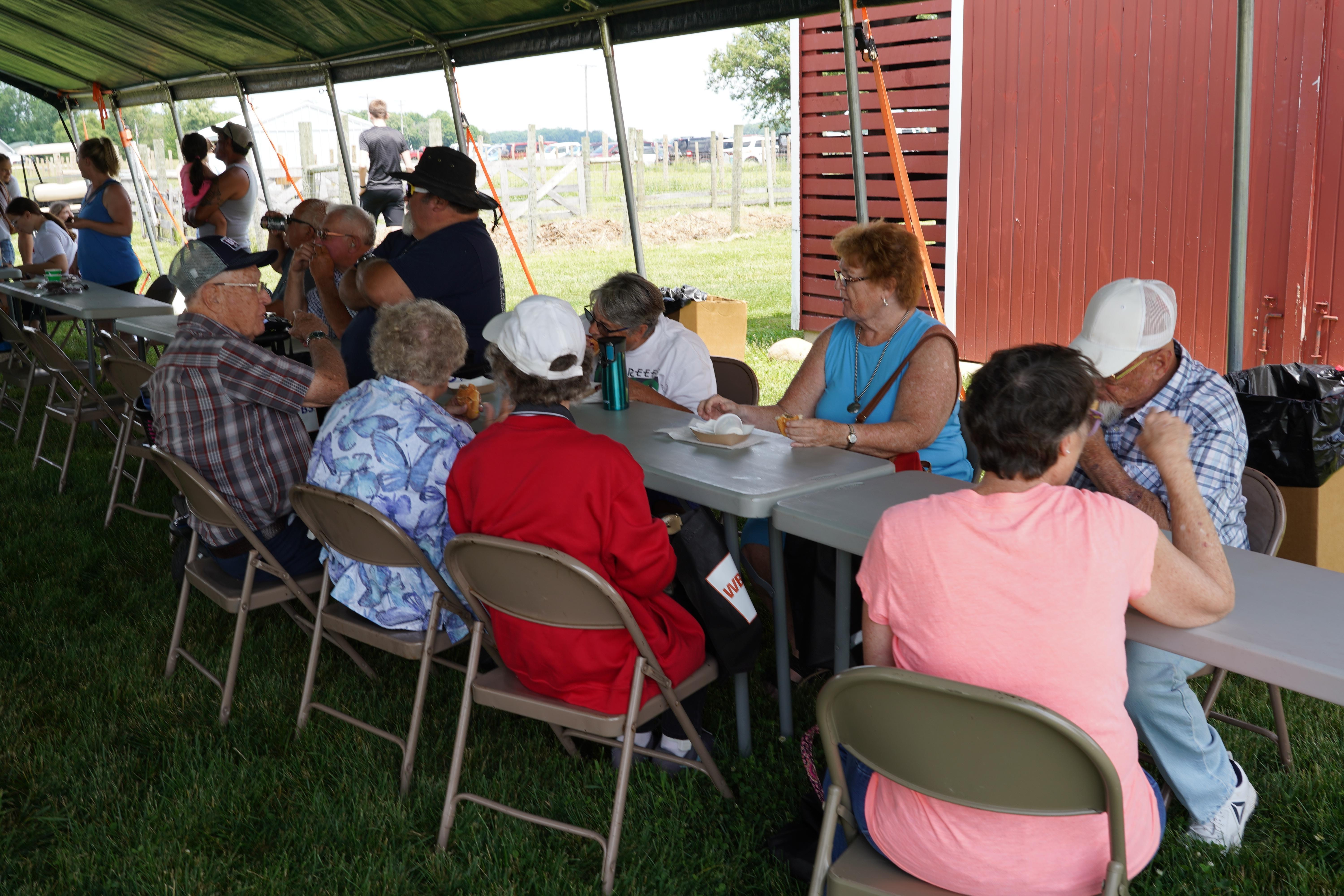 patrons at table outside