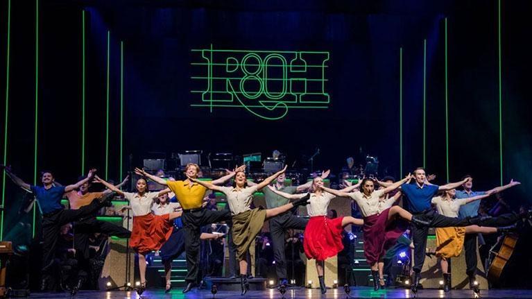 a pitcure of dancers in the 80th anniversary performance