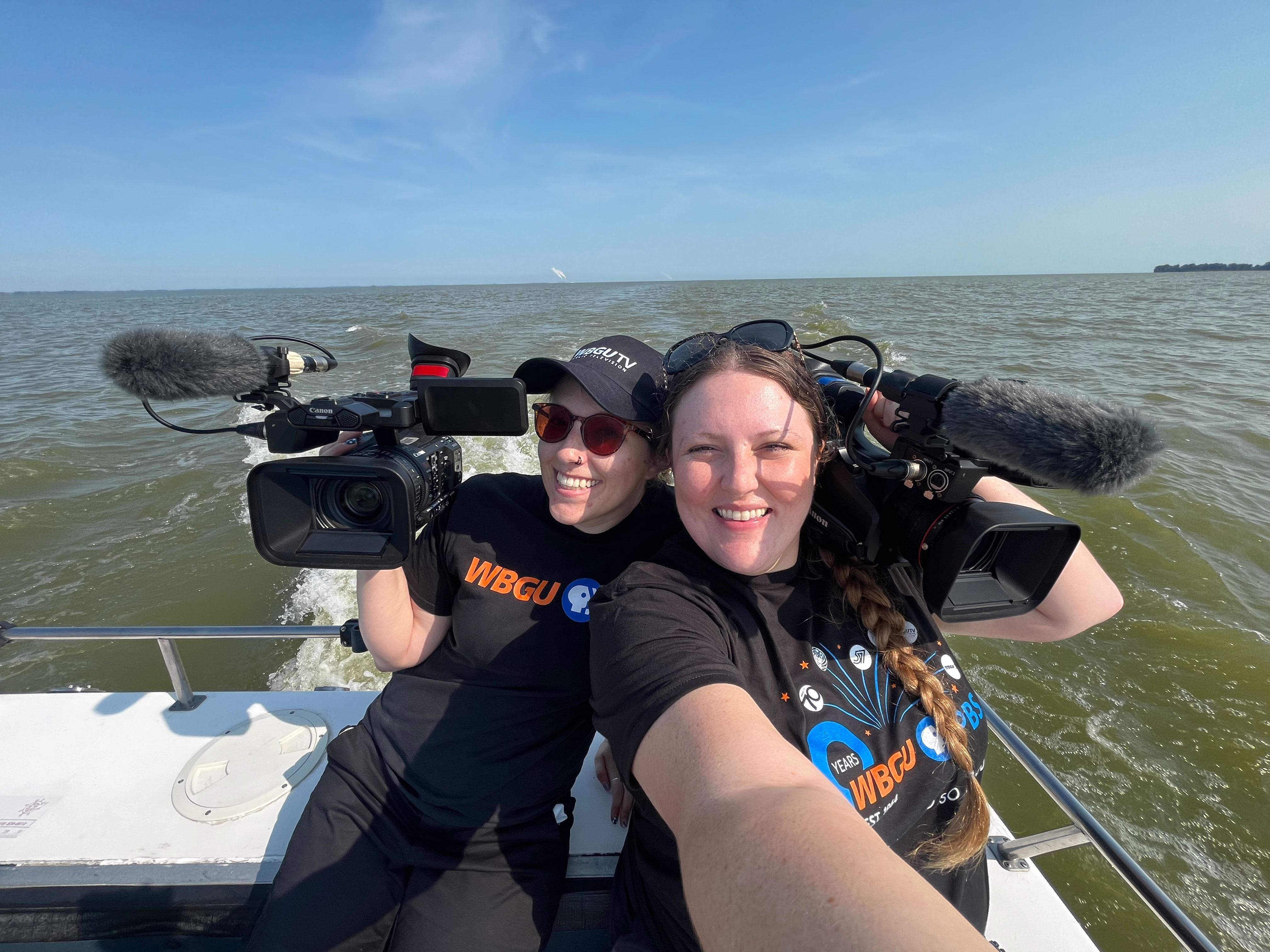 Meghan Murray and Kaitlyn Kuch Finkler in a boat headed to Toledo Lighthouse