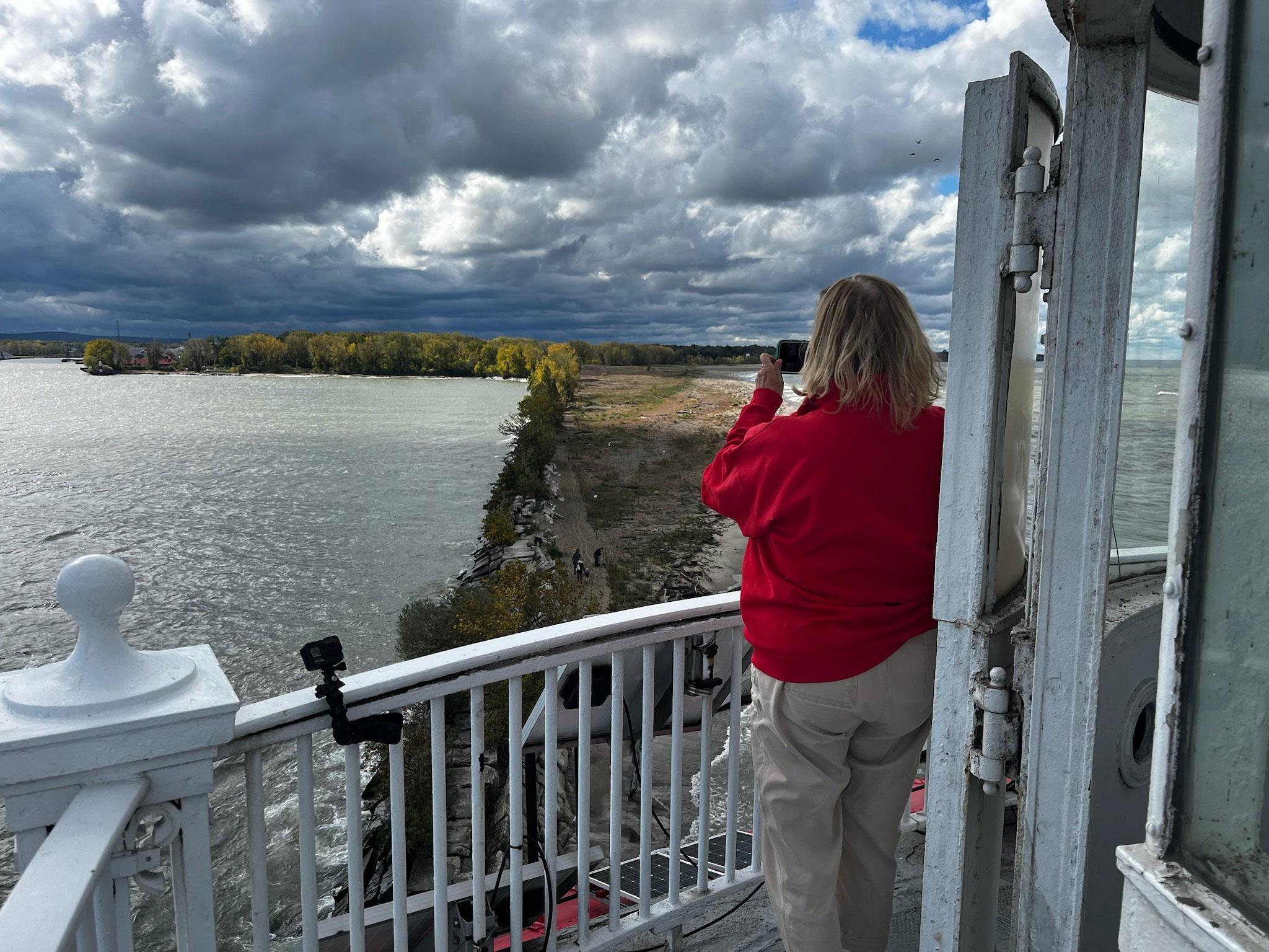 Taking a photo from the Fairport Harbor West lighthouse deck
