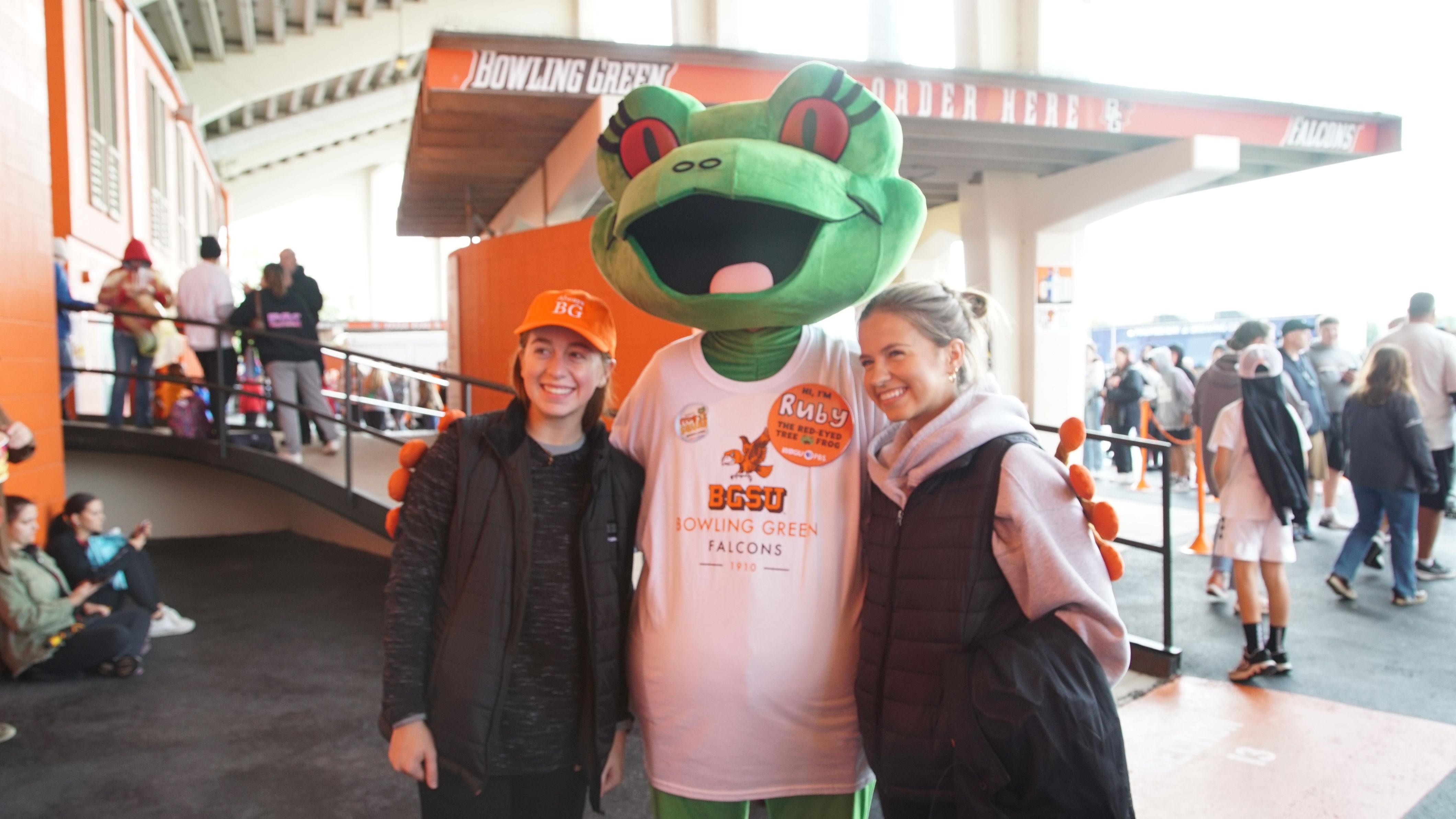 Station mascot Ruby with two BGSU students