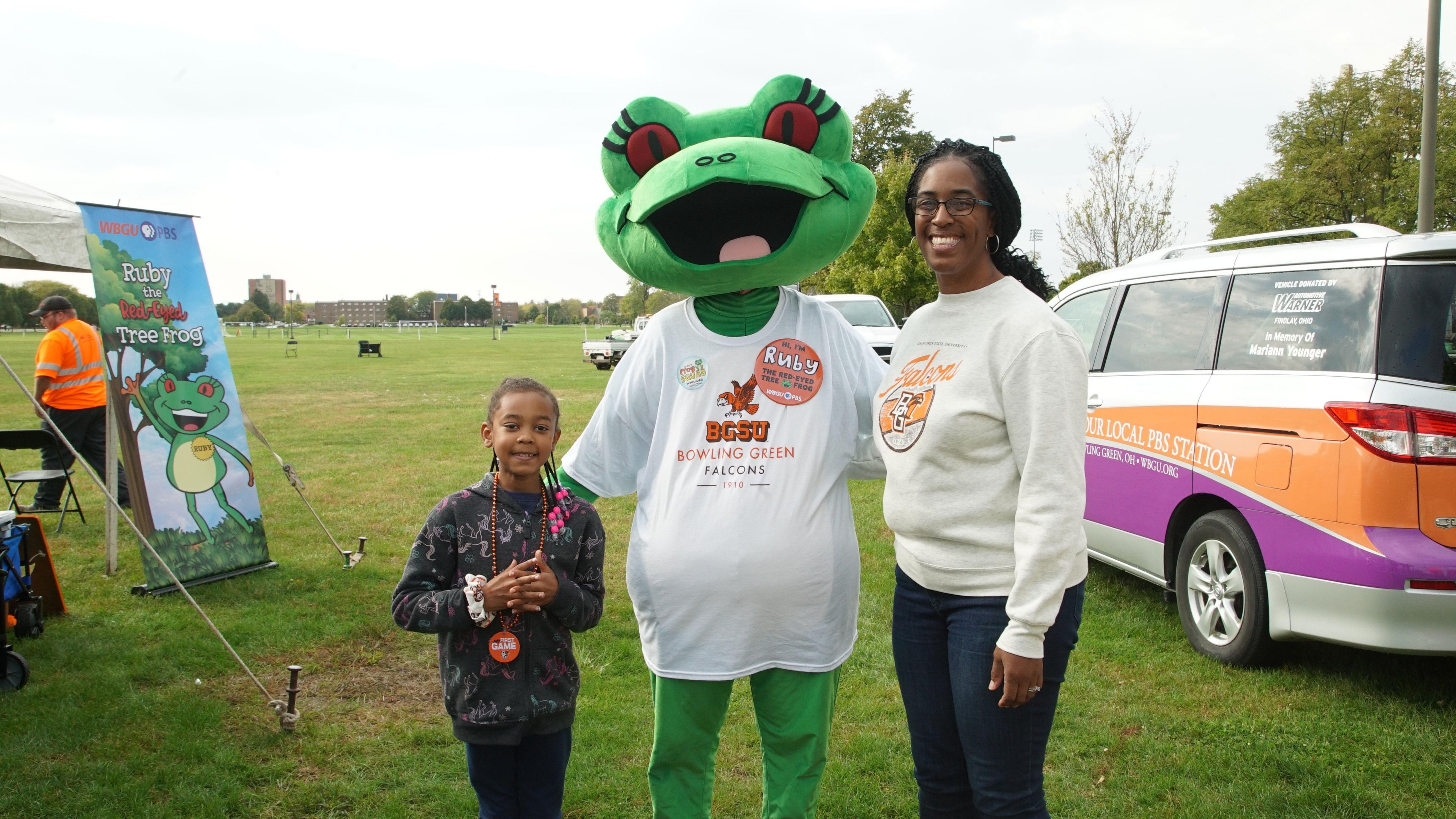 Station mascot Ruby with mom and child