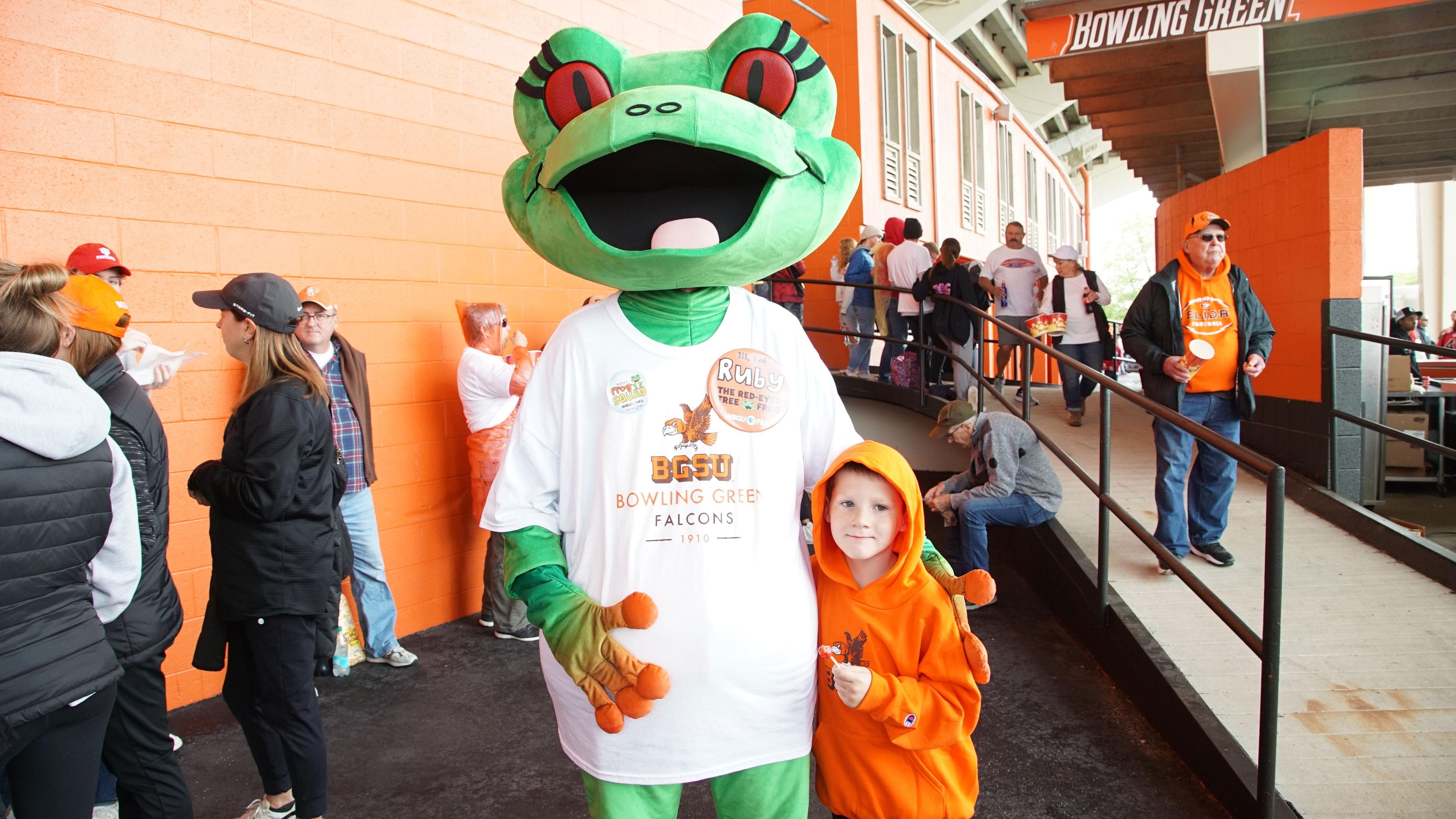 Station mascot Ruby with boy