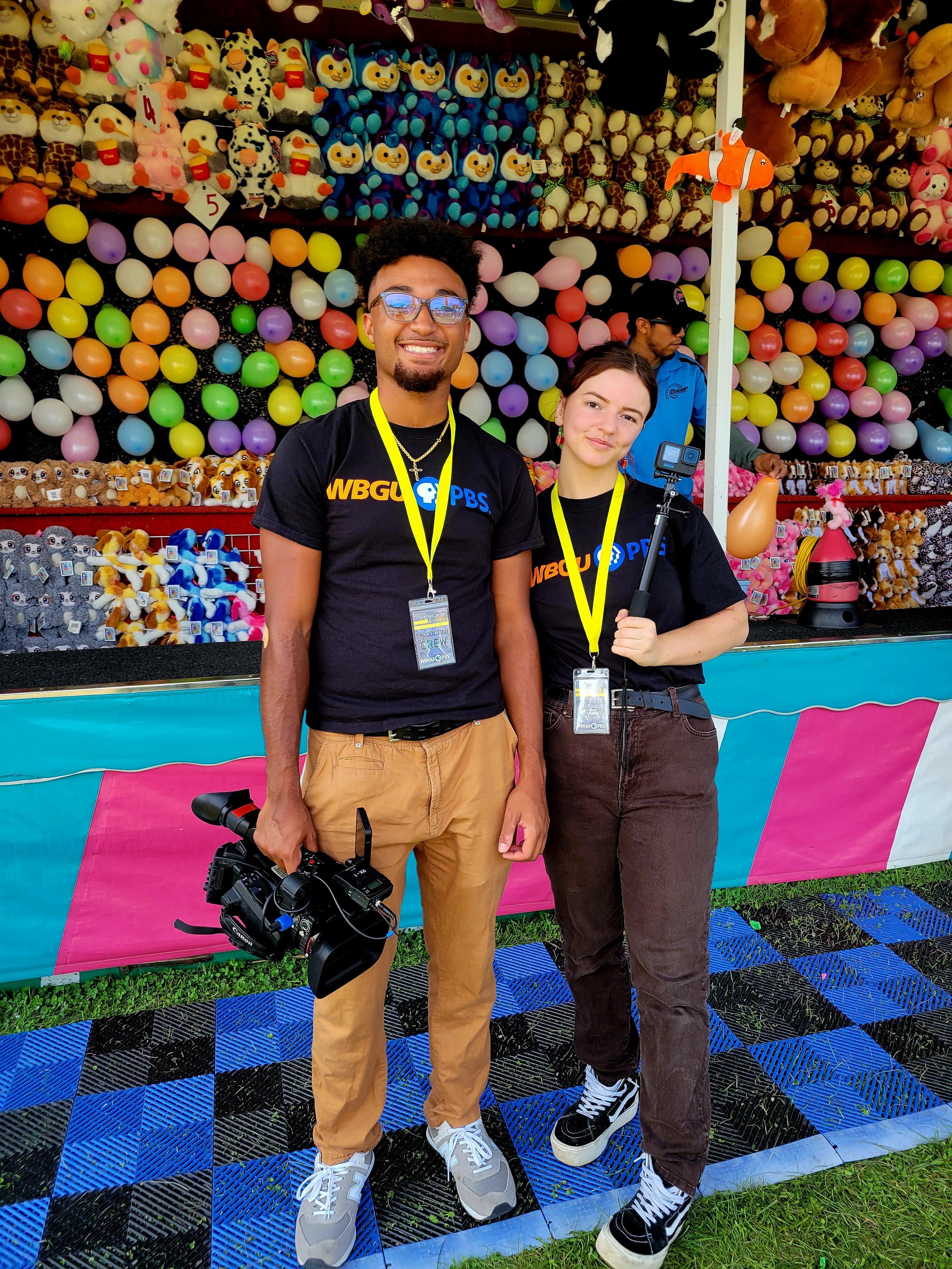 Students in front of carnival games