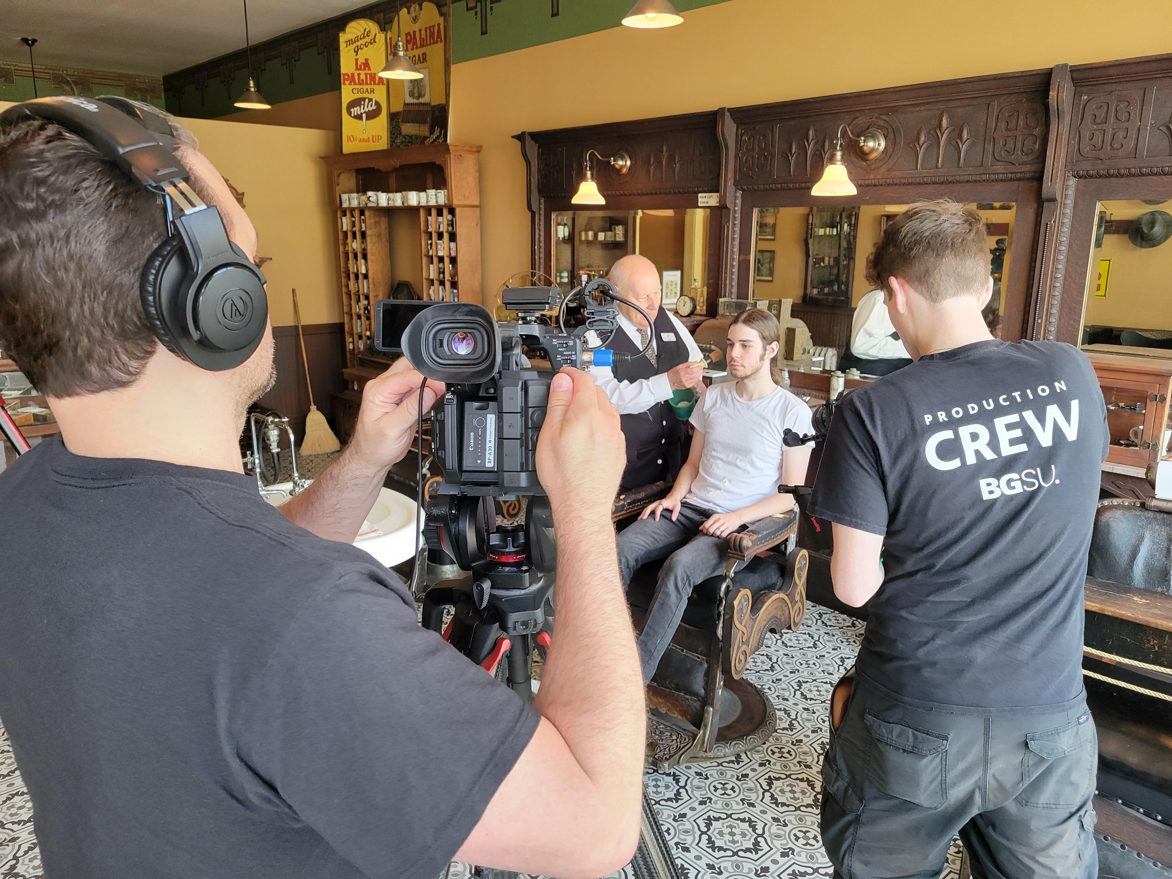 Filming getting a shave