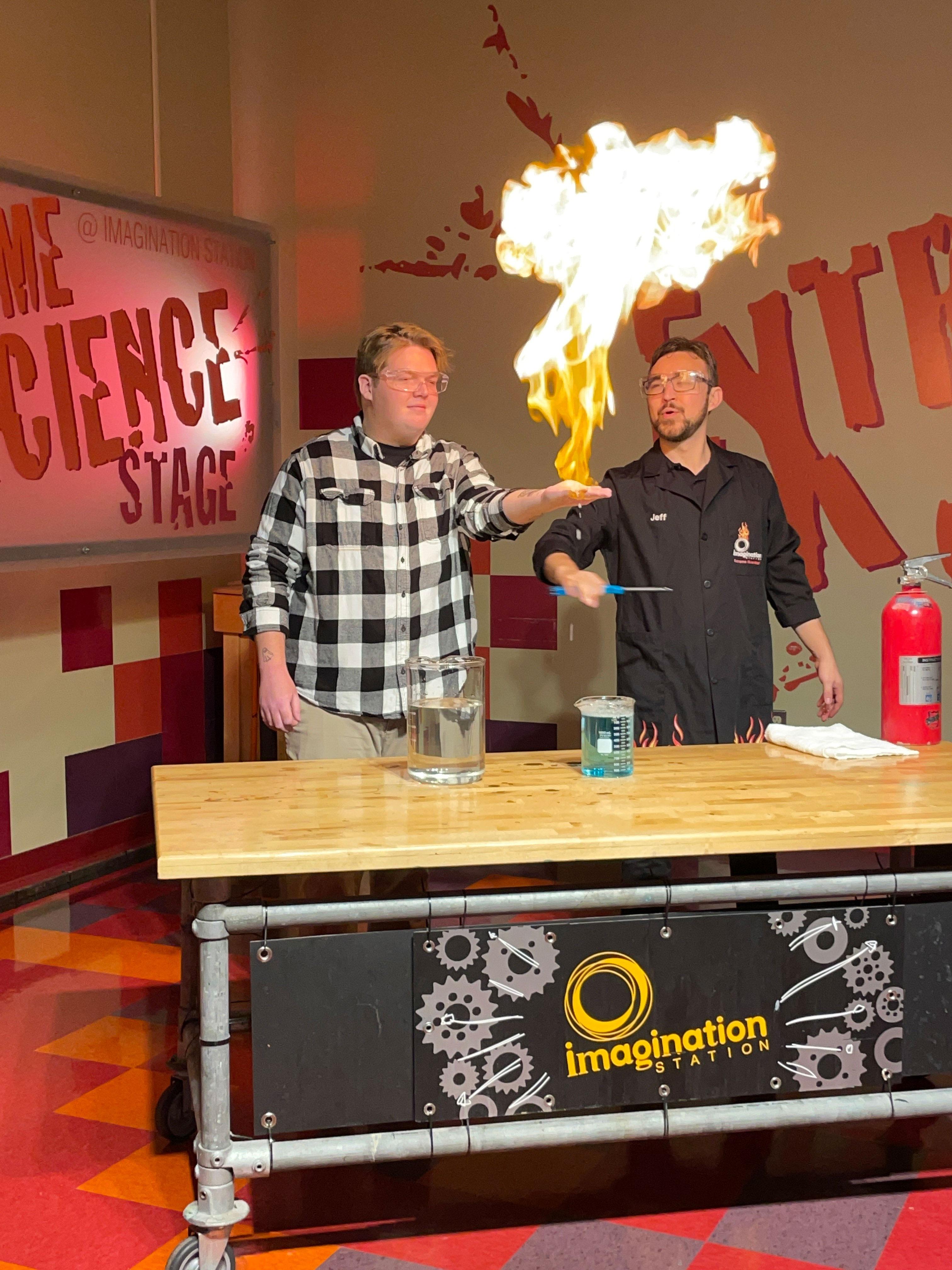 Filming experiments with fire at the Imagination Station