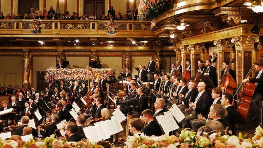 a picture of the Vienna orchestra, musicians with sheet music