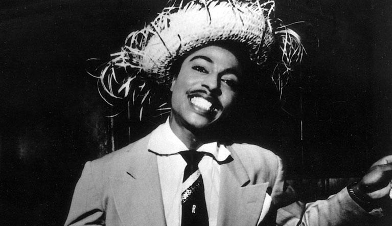 Young Little Richard wearing a straw hat