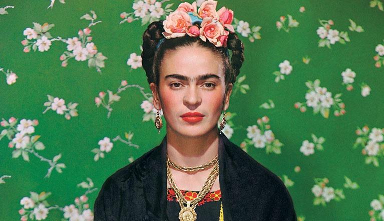Portrait of Frida Kahlo on a green floral background