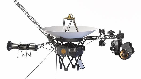 image showing Voyager with various cameras and other scientific instruments extending out from the main body of the spacecraft