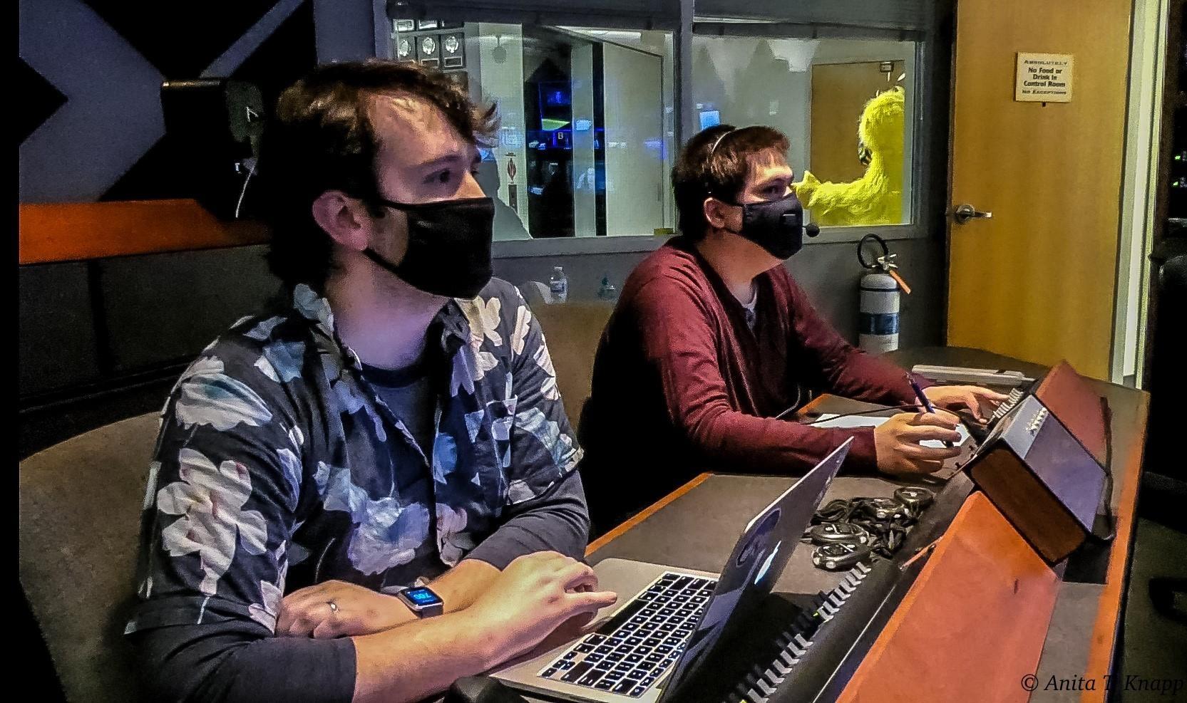 Logan Finney and Devon Downey in the KAID control room during a live Coronavirus Q&A special.