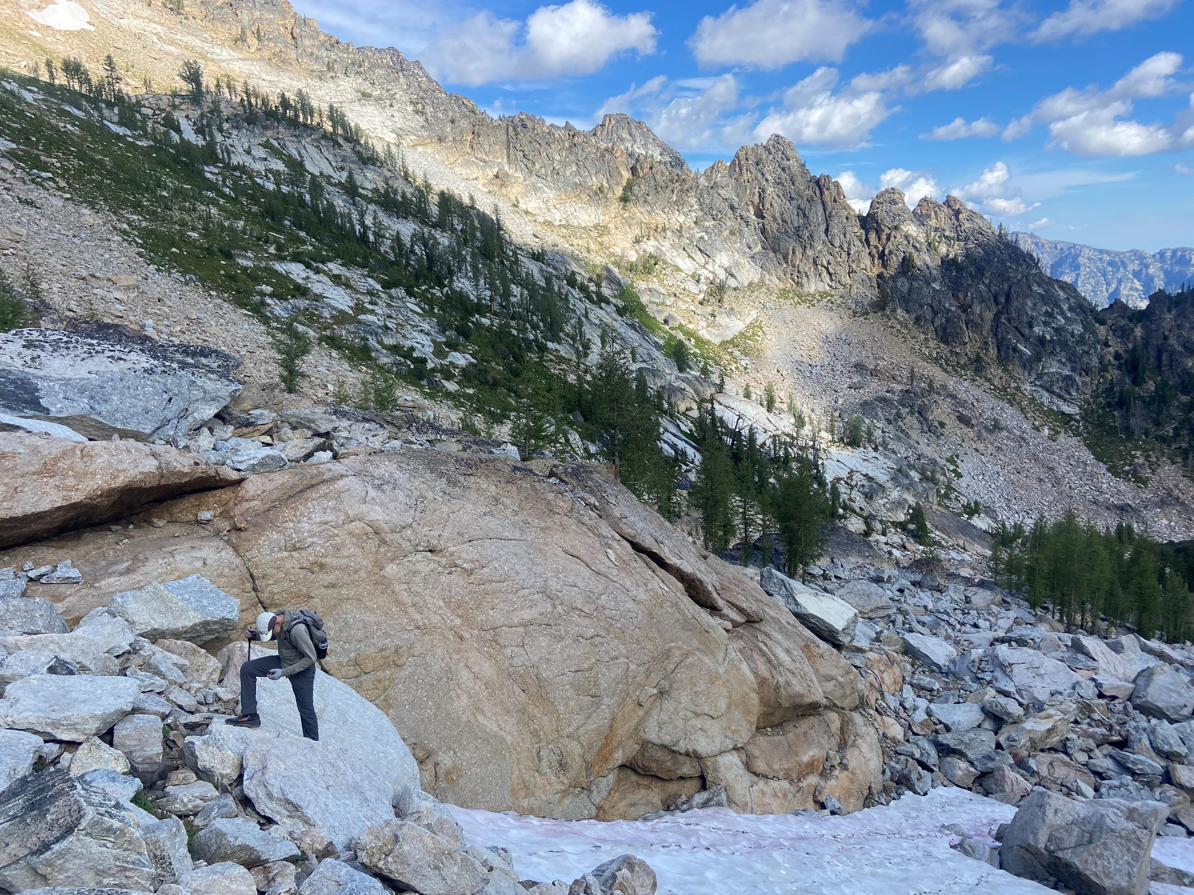 A man hiking up a mountain