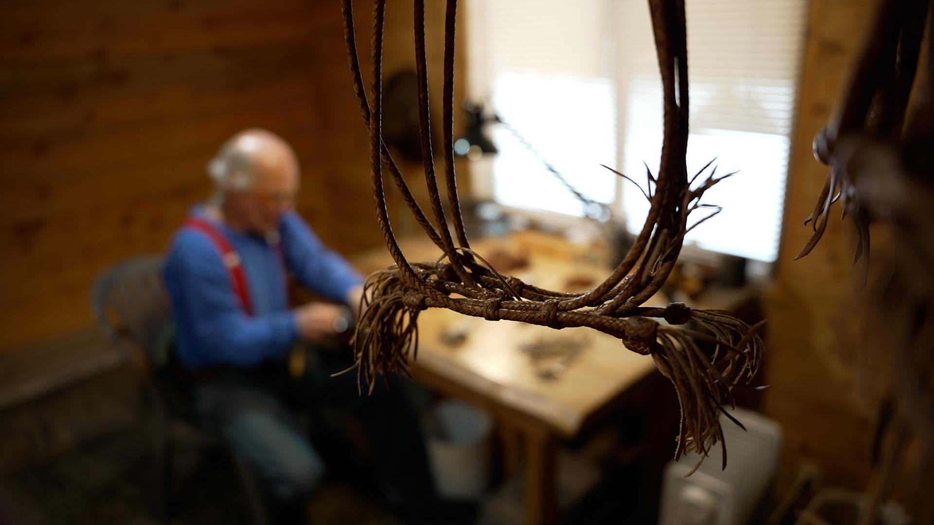 Mike “Hooey” Storch, a leather braider in Donnelly, Idaho, at work.