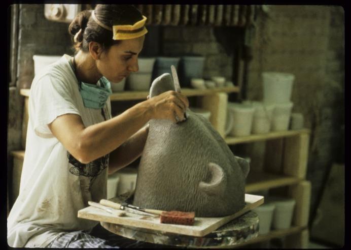 Marilyn Lysohir working on a bear sculpture