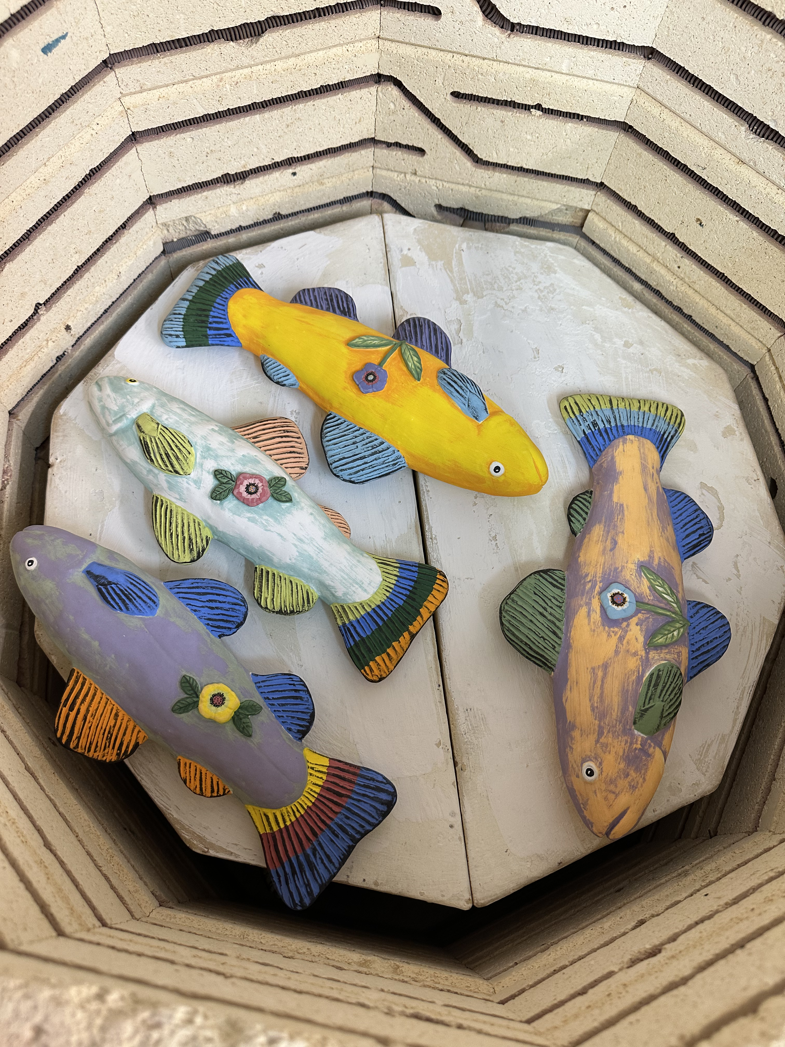 Fish sculptures in the kiln