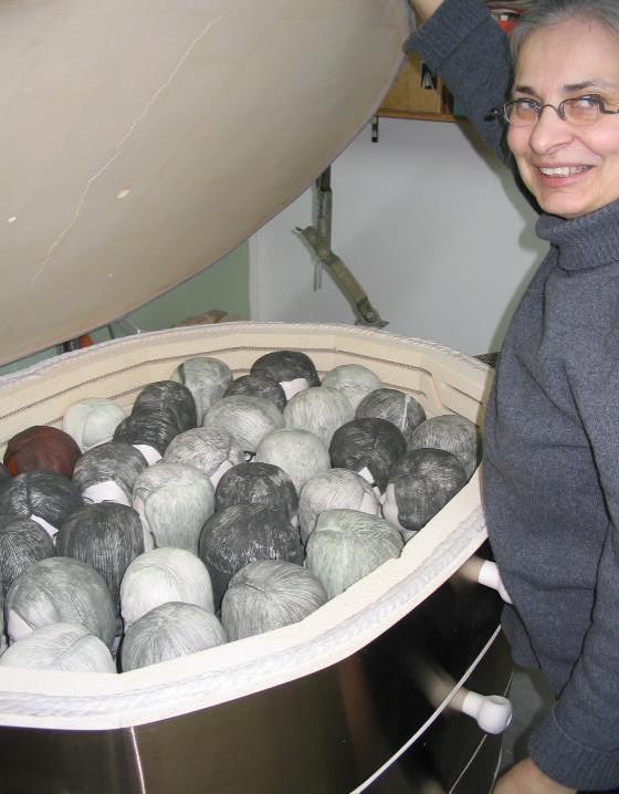 Lysohir opening kiln with lots of "Good Girls" heads