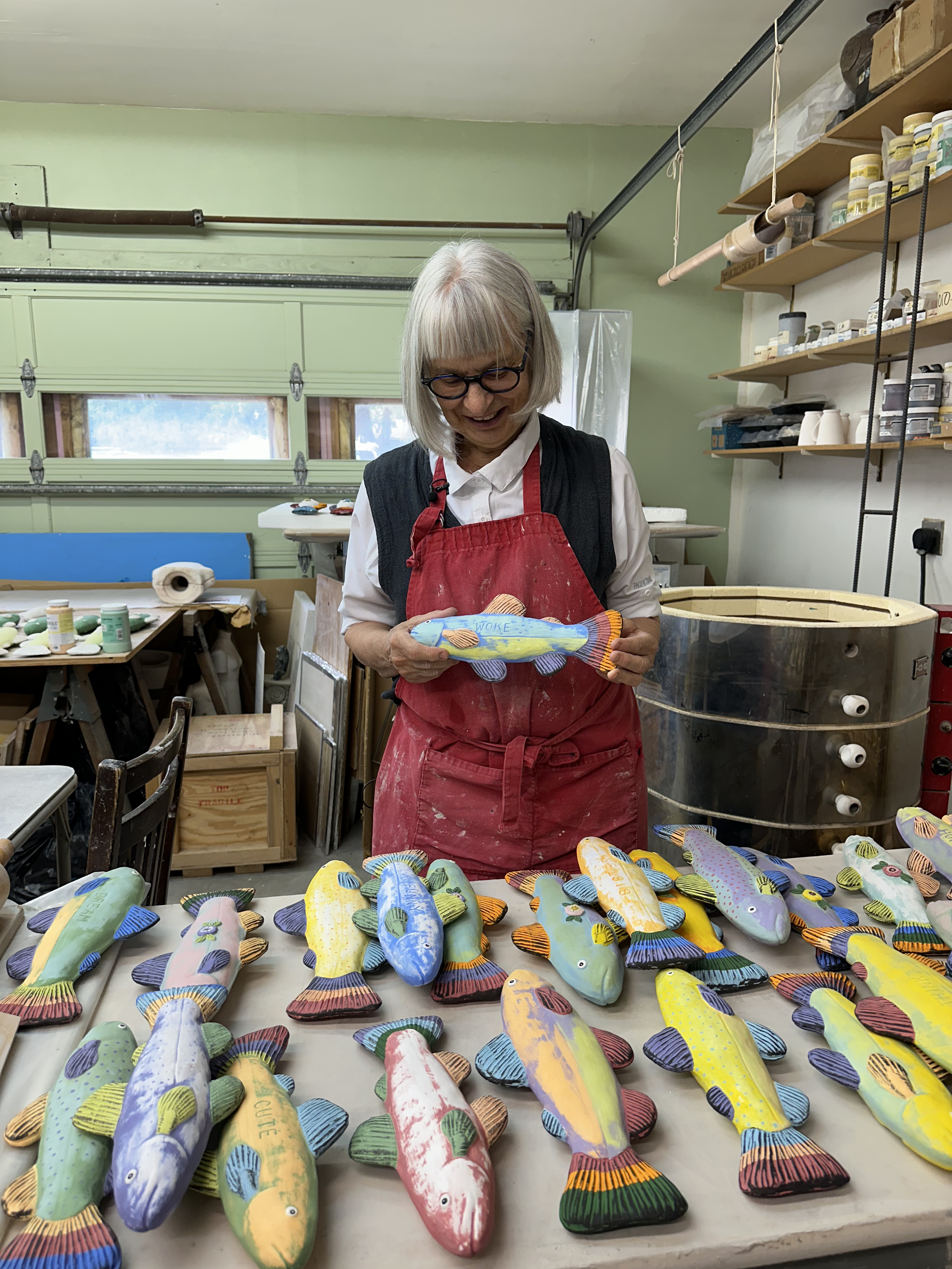 Lysohir displaying one of her finished fish pieces