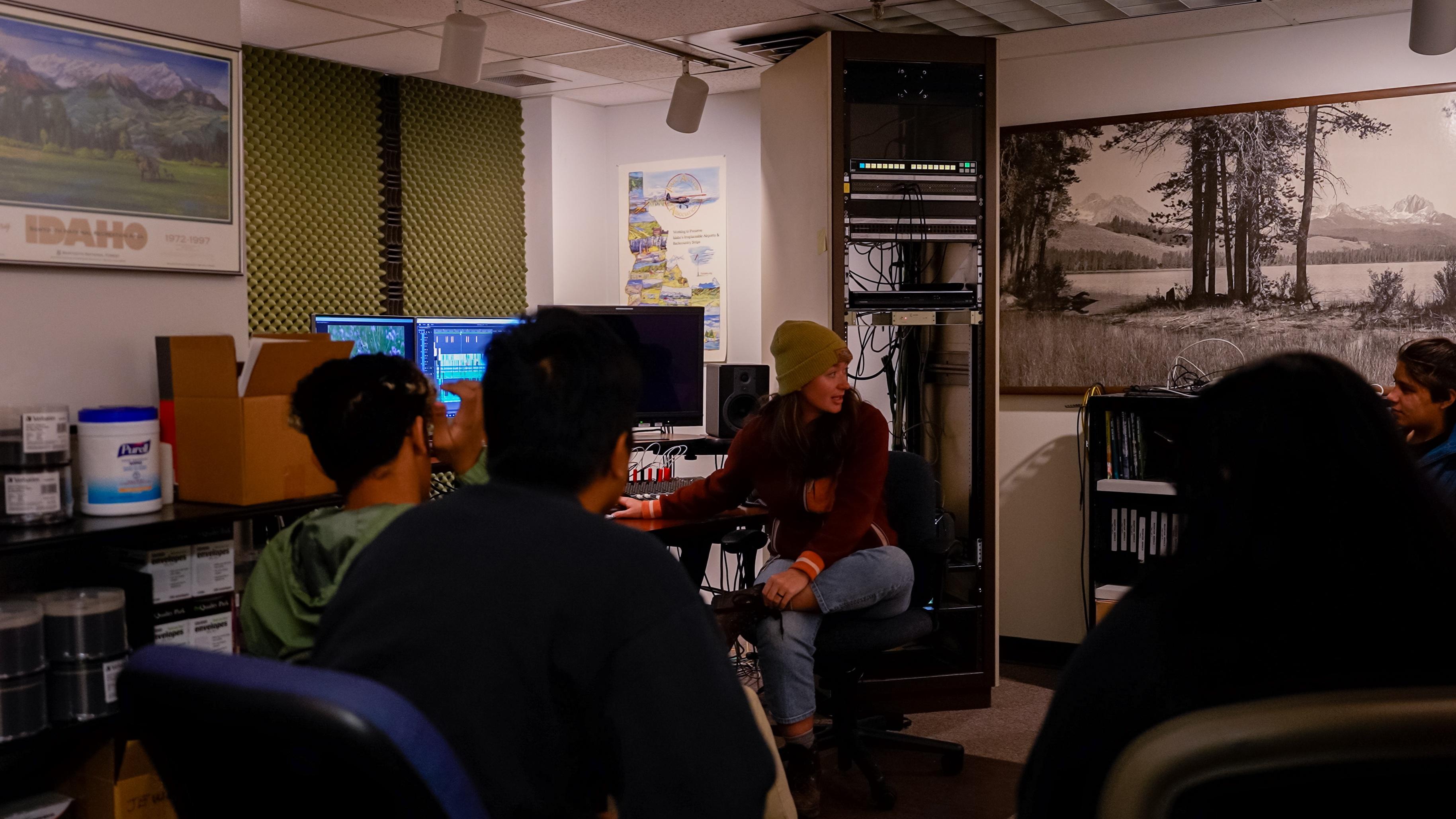 IdahoPTV Director/Videographer talking to a group of high school students