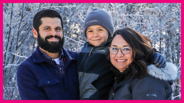 Family of three with father, child and mother smiling