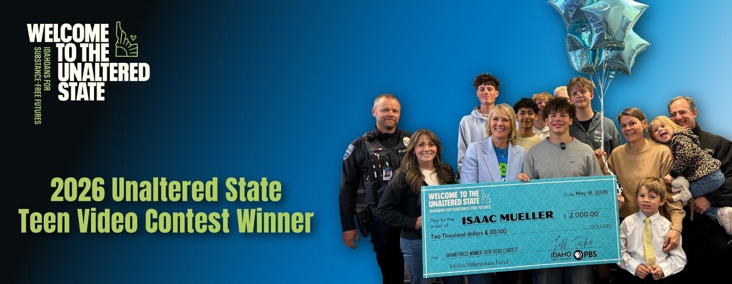 Video contest Issac Mueller with family and school staff