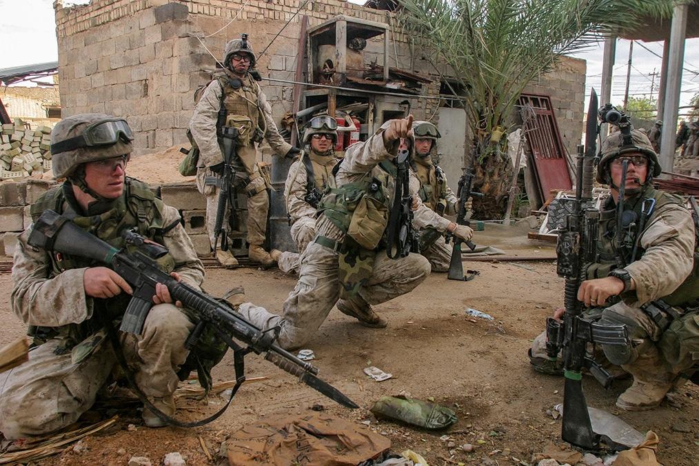 Marines make their way through the streets of Najaf.