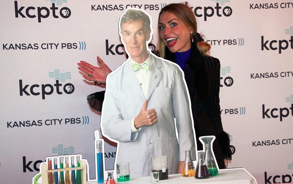Woman posing with Bill Nye cutout