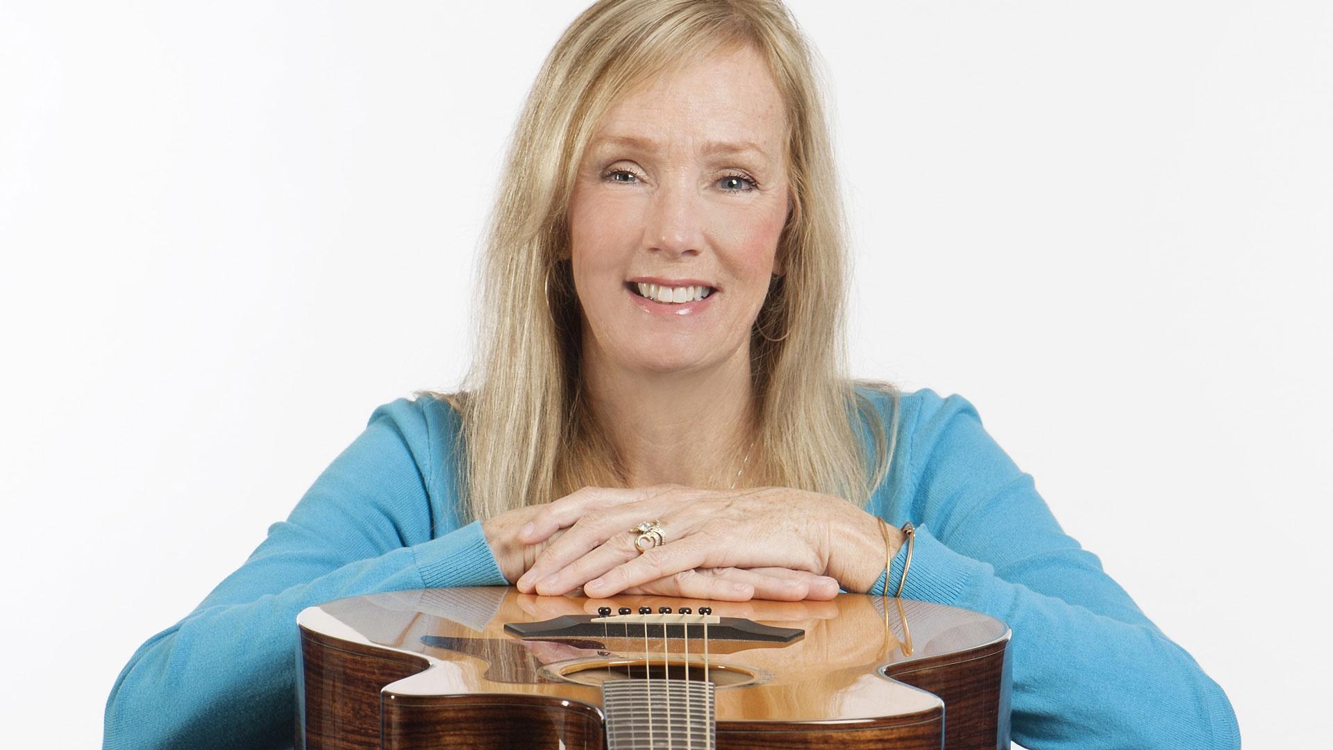 Marlene Hutchinson with guitar