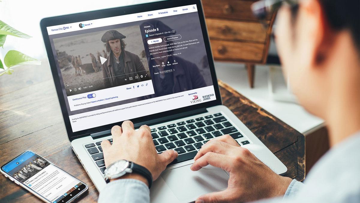 Man viewing Poldark on laptop screen